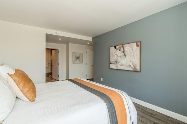 bedroom featuring dark wood-type flooring