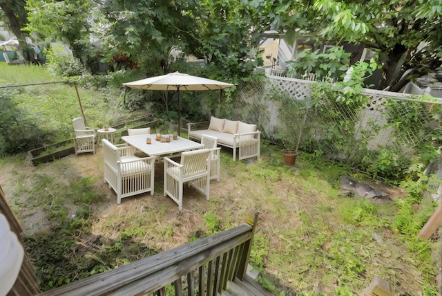 215 48th St Unit 101, Union City, NJ 07087 - fenced backyard featuring an outdoor living space and outdoor dining area