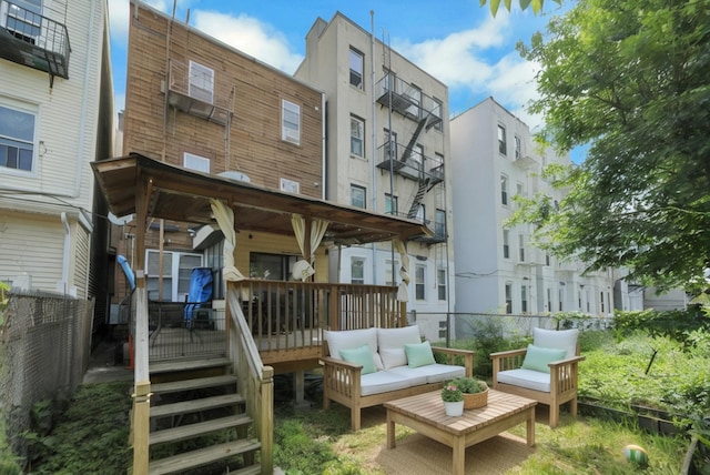 215 48th St Unit 101, Union City, NJ 07087 - rear view of house with a wooden deck and an outdoor living space
