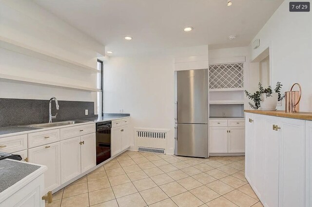 2600 Kennedy Blvd Unit 7A, Jersey City, NJ 07306 - kitchen featuring freestanding refrigerator, open shelves, dishwasher, white cabinets, and light tile patterned flooring
