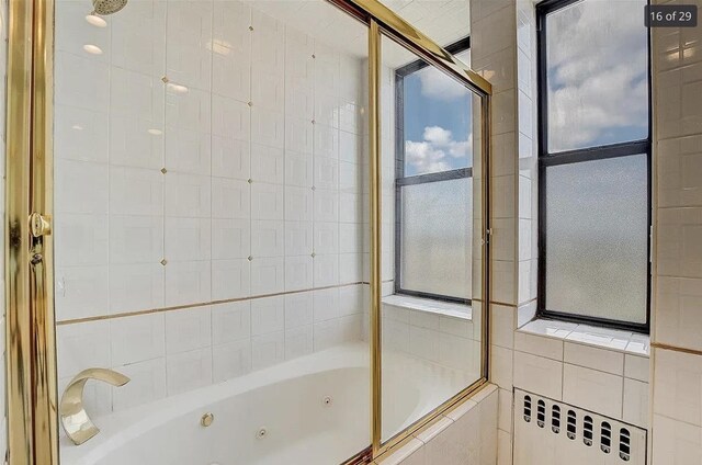 2600 Kennedy Blvd Unit 7A, Jersey City, NJ 07306 - bathroom with radiator and a combined bath / shower with jetted tub