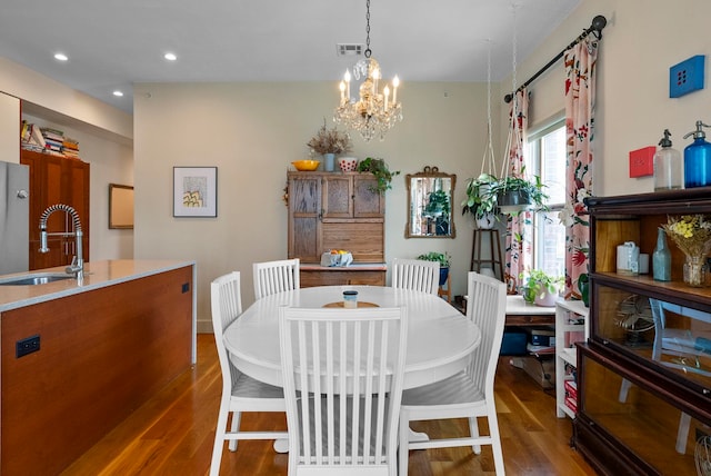 390 1st St Unit 3, Jersey City, NJ 07302 - dining room featuring wood finished floors, a chandelier, and recessed lighting