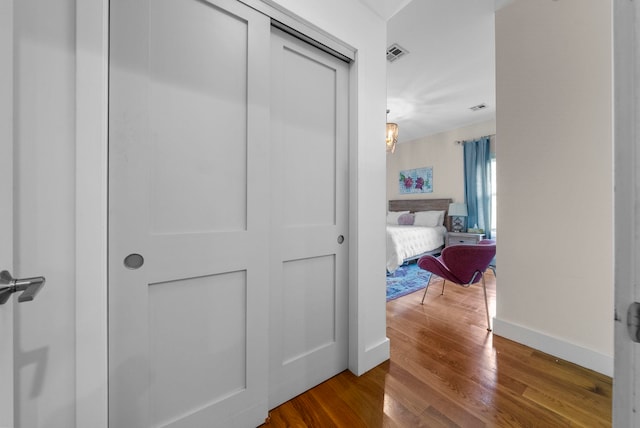 390 1st St Unit 3, Jersey City, NJ 07302 - hallway featuring wood finished floors and baseboards