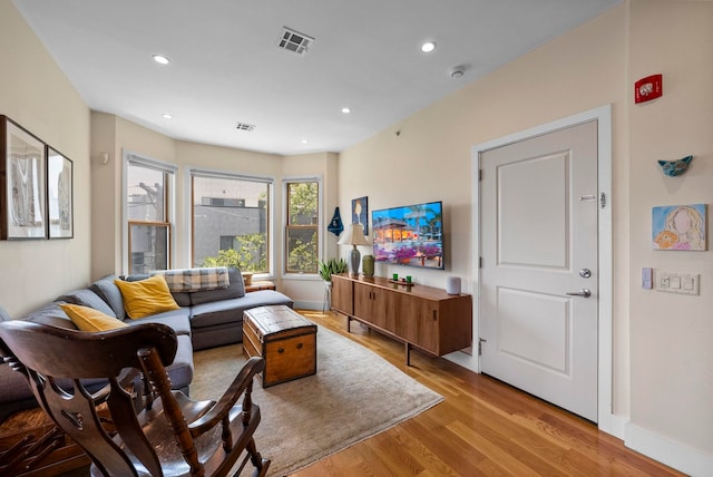390 1st St Unit 3, Jersey City, NJ 07302 - living area featuring wood finished floors and recessed lighting
