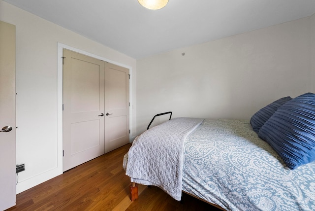 390 1st St Unit 3, Jersey City, NJ 07302 - bedroom with wood finished floors and a closet