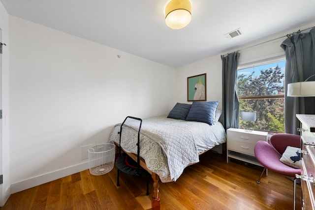 390 1st St Unit 3, Jersey City, NJ 07302 - bedroom featuring wood finished floors and baseboards
