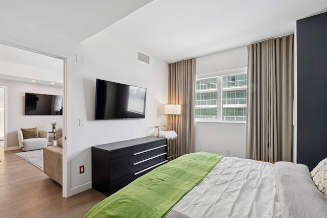 800 Ave At Port Imperial Unit 517, Weehawken, NJ 07086 - bedroom with wood finished floors and baseboards