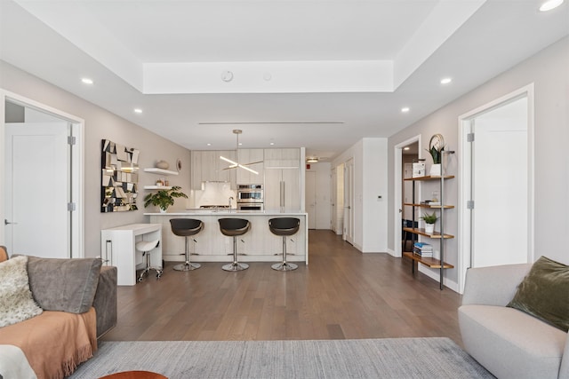 800 Ave At Port Imperial Unit 517, Weehawken, NJ 07086 - living room featuring dark wood-style flooring, recessed lighting, and baseboards