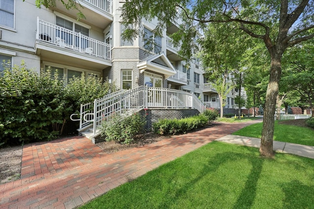 surrounding community featuring a lawn