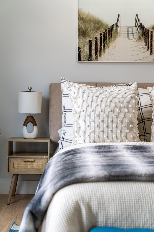 bedroom featuring wood-type flooring