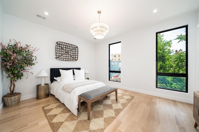 bedroom featuring light hardwood / wood-style flooring