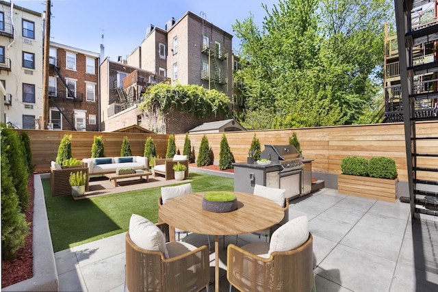 906 Park Ave Unit 1, Hoboken, NJ 07030 - fenced backyard with a patio and outdoor dining area