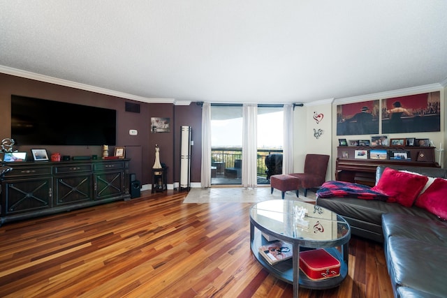 living room with expansive windows, wood finished floors, visible vents, and ornamental molding