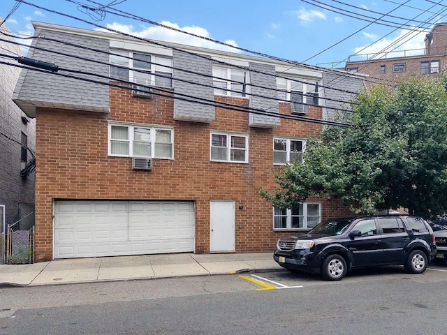 view of building exterior with a garage