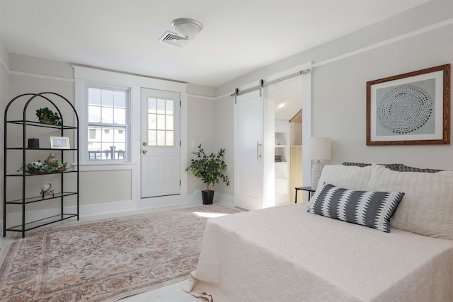 bedroom with a barn door