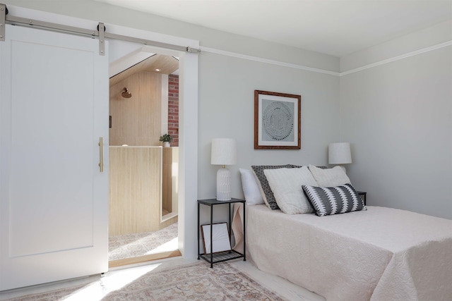 bedroom with a barn door