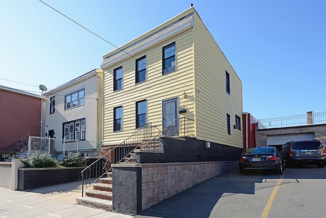 view of front of property featuring a garage