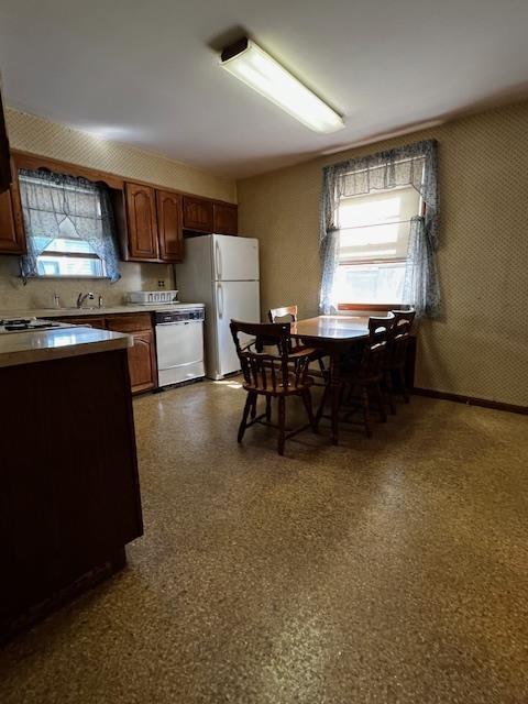 40 E 31st St, Bayonne, NJ 07002 - kitchen featuring white appliances