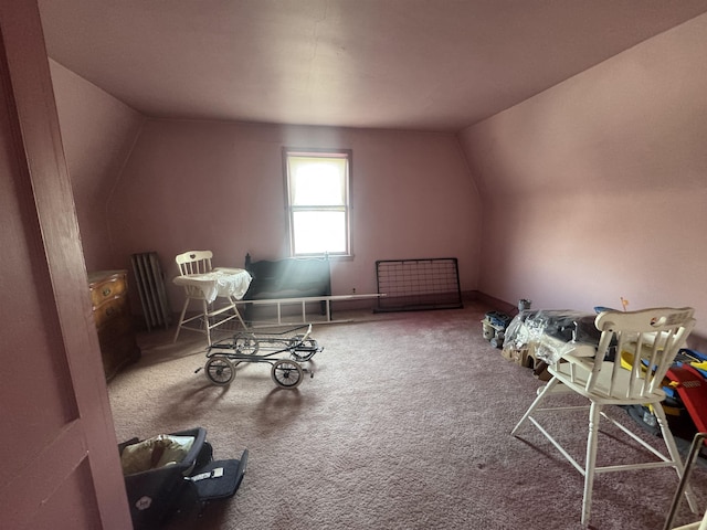 bonus room with carpet floors and lofted ceiling