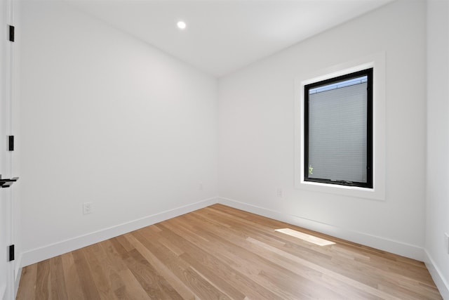 28 Beacon Ave Unit 2, Jersey City, NJ 07306 - empty room featuring light wood-style flooring and recessed lighting