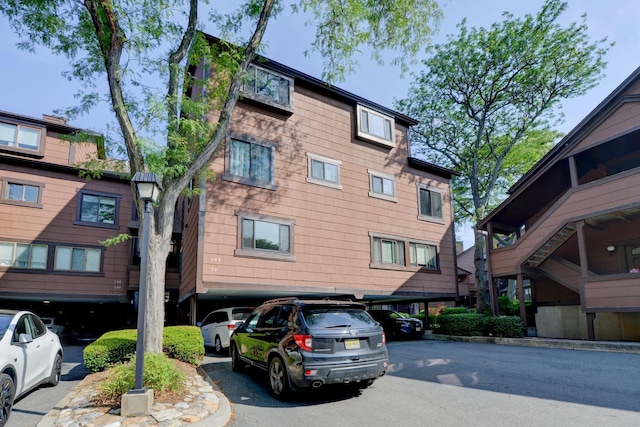 98 Sandpiper Ky, Secaucus, NJ 07094 - view of building exterior featuring covered parking