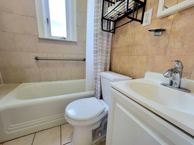 1214 79th St, North Bergen, NJ 07047 - full bathroom with tile walls, shower / bath combo, vanity, and tile patterned flooring