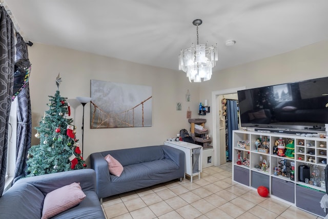 living room featuring light tile patterned floors and an inviting chandelier