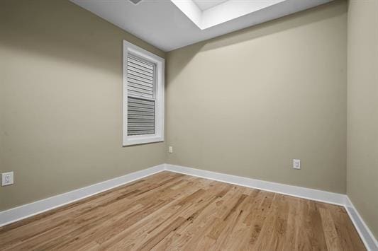 3611 John F Kennedy Blvd Unit 2, Jersey City, NJ 07307 - spare room featuring wood finished floors and baseboards