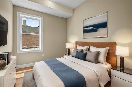 3611 John F Kennedy Blvd Unit 2, Jersey City, NJ 07307 - bedroom with baseboards and wood finished floors