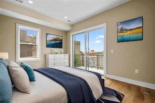 3611 John F Kennedy Blvd Unit 2, Jersey City, NJ 07307 - bedroom featuring access to exterior, wood finished floors, baseboards, and recessed lighting