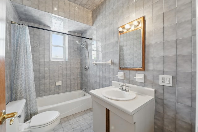 3444 John F Kennedy Blvd Unit 4F, Jersey City, NJ 07307 - bathroom featuring tile walls, shower / tub combo, toilet, tile patterned floors, and vanity
