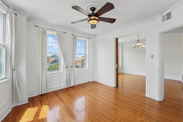 3444 John F Kennedy Blvd Unit 4F, Jersey City, NJ 07307 - spare room featuring a chandelier, light wood finished floors, ceiling fan, and crown molding