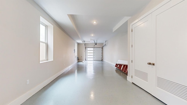 garage with baseboards