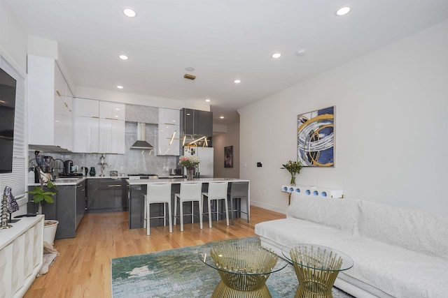 living room with light hardwood / wood-style flooring