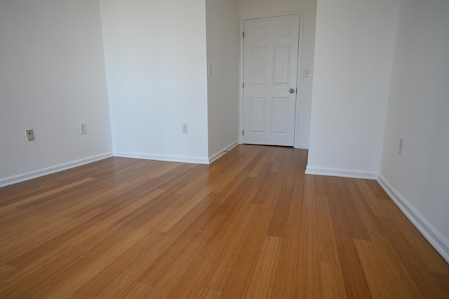 20 2nd St Unit 2111, Jersey City, NJ 07034 - spare room with light wood-style flooring and baseboards