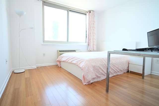 20 2nd St Unit 2111, Jersey City, NJ 07034 - bedroom with light wood-style floors and baseboards