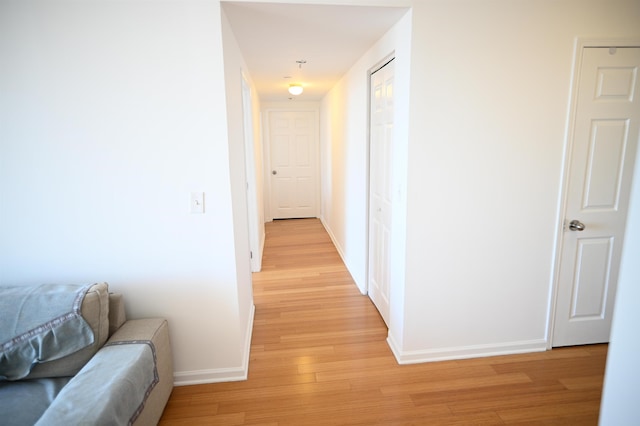20 2nd St Unit 2111, Jersey City, NJ 07034 - hallway featuring light wood finished floors and baseboards