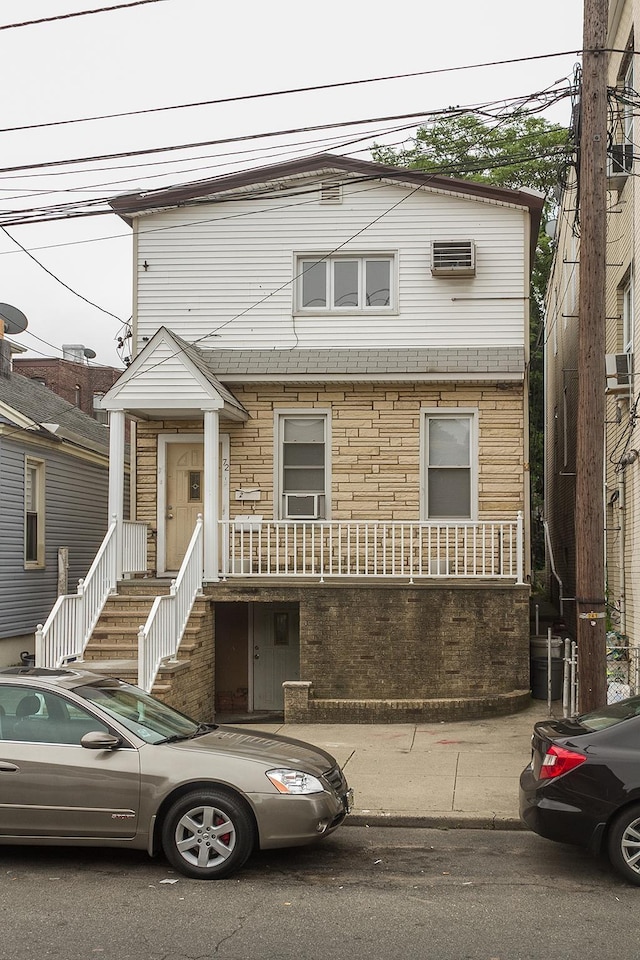 72 W 22nd St, Bayonne, NJ 07002 - multi unit property featuring stone siding
