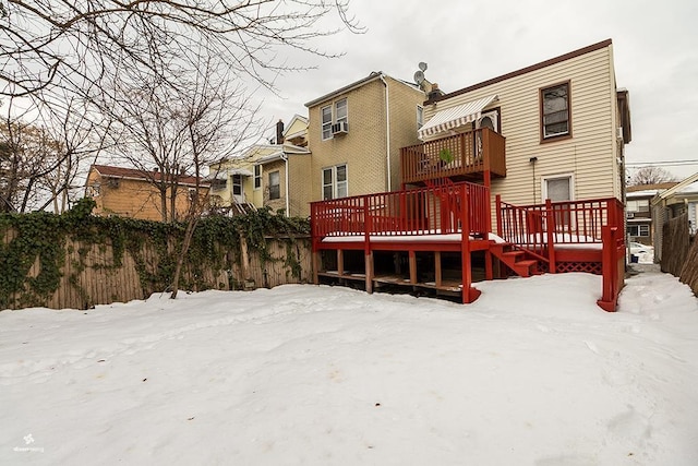 72 W 22nd St, Bayonne, NJ 07002 - snow covered back of property featuring a deck and cooling unit