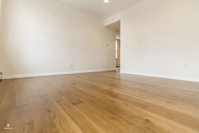 72 W 22nd St, Bayonne, NJ 07002 - unfurnished room with wood finished floors, baseboards, and recessed lighting