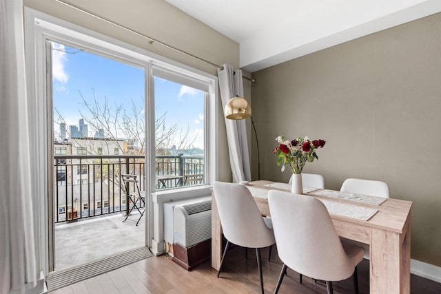 3312 Hudson Ave Unit 3H, Union City, NJ 07087 - dining room featuring wood finished floors and healthy amount of natural light