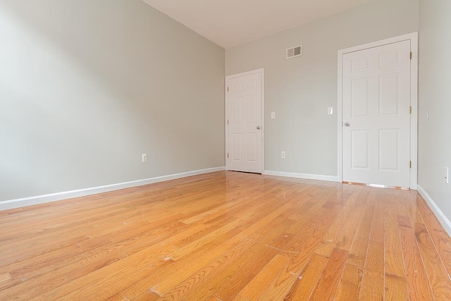 empty room featuring light hardwood / wood-style floors