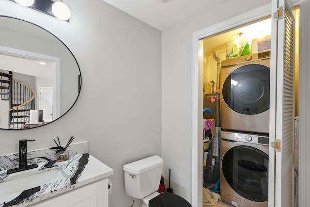 609 Jefferson St Unit 4D, Hoboken, NJ 07030 - bathroom with stacked washing machine and dryer and vanity