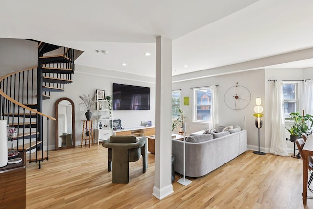 609 Jefferson St Unit 4D, Hoboken, NJ 07030 - living area featuring stairway, wood finished floors, recessed lighting, and arched walkways