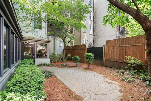 view of yard with a patio area and fence