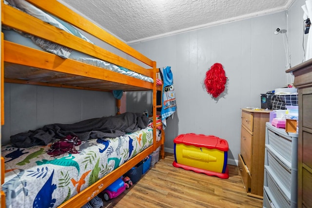 bedroom with light wood-type flooring