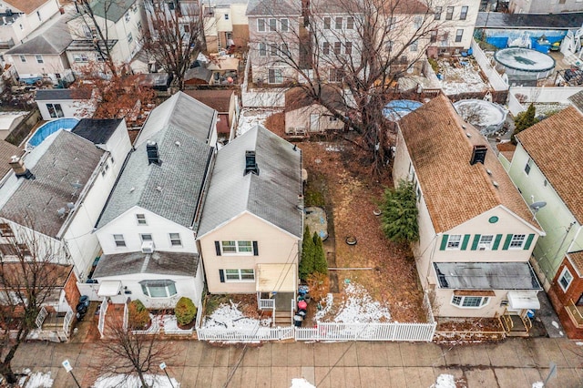 birds eye view of property with a residential view