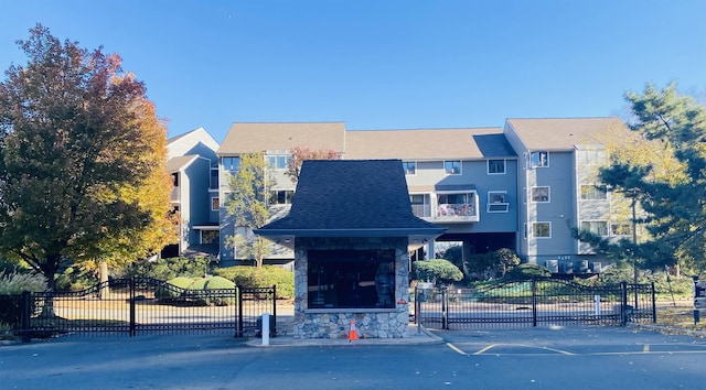 view of building exterior featuring fence