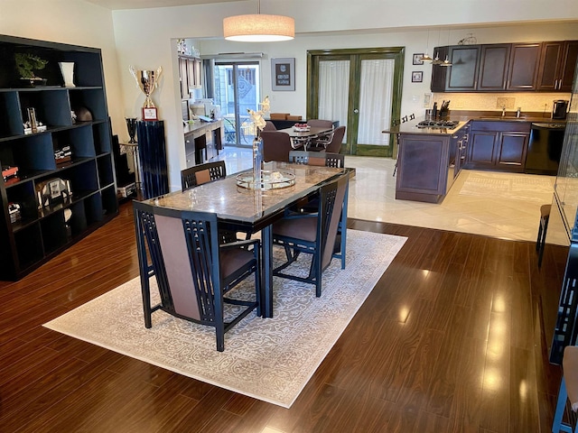 dining area featuring light wood-type flooring