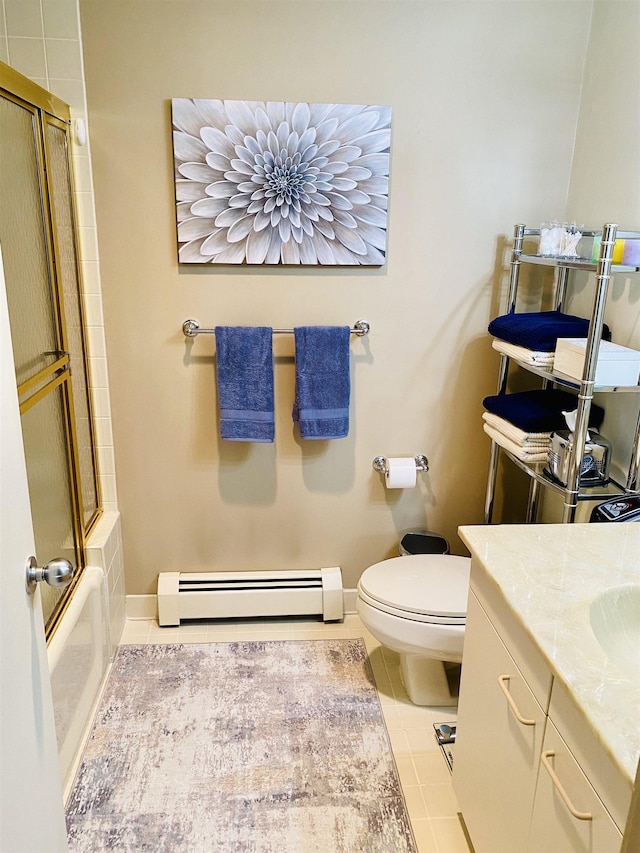 bathroom featuring tile patterned floors, toilet, baseboards, and a baseboard radiator